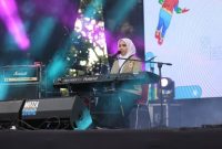 CAPTION FOTO:
Putri Ariani menutup Pionir Gamada di kampus UGM Yogyakarta, Sabtu 3 Agustus 2024.