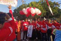 Foto: Ratusan warga desa Jalmak tunjukkan antusiasme tinggi mengikuti Jalan Sehat 