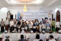 Pemberian Santunan Kepada Kaum Duafa dan Anak Yatim