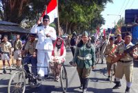 Ilustrasi karnaval kemerdekaan yang biasanya menjadi simbol kebersamaan rakyat. Tahun ini, Kecamatan Manding kehilangan tradisi tersebut