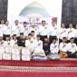 KBO Satreskrim Polres Sumenep Ipda Roni Agoes Arbiyono, S.H., bersama personel saat menyerahkan bantuan sosial kepada anak-anak Panti Asuhan Muhammadiyah Sumenep pada peringatan HUT ke-78 Sat Reskrim Polri.
