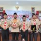 Bupati Sumenep, Achmad Fauzi Wongsojudo, saat memberikan sambutan pada Rakercab Gerakan Pramuka Kwartir Cabang Sumenep 2026 di Aula DPMPTSP Sumenep, Senin (22/6/2026), menekankan pentingnya Pramuka sebagai pencetak generasi berintegritas dan berjiwa pengabdi.