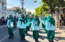 Caption: Peserta Gerak Jalan SMPN 1 Sampang Nomor Urut 85 Regu Putri (Sumber Foto: Agus Junaidi/Detikzone.id)