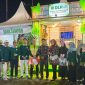 Ket Foto: Kepala DLH Sumenep Anwar Syahroni Yusuf bersama jajaran saat sesi foto di depan stan DLH pada Pameran Pembangunan Madura Night Vaganza (MNV) 2026 di GOR A. Yani Pangligur, Sumenep.