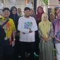 Ket Foto: Bupati Sumenep bersama jajaran Diskoperindag berfoto bersama usai meninjau stan UMKM pada Madura Culture Festival 2026 di GOR A. Yani Pangligur, Sumenep.