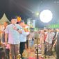 Ket Foto:
Bupati Sumenep Achmad Fauzi Wongsojudo saat mencoba fasilitas video booth di Stan Bappeda dalam rangkaian Madura Culture Festival (MCF) #4 2026 di Lapangan GOR A. Yani Pangligur, Sumenep.