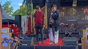 Ket Foto: Haji Khairul Umam (Haji Her) bersama Direktur Utama Central 88 Gold and Jewellery, Ali Zainal Abidin (Bang Ali), saat menghadiri Jalan-Jalan Sehat (JJS) dalam rangka soft opening Central 88 Gold and Jewellery Pamekasan, Minggu (30/8/2026). Momen tersebut menjadi ajang silaturahmi sekaligus Haji Her mengungkap jasa Bang Ali dalam perjalanan hidupnya.