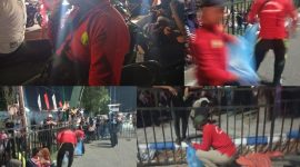 Ket Foto: Petugas kebersihan DLH Sumenep membersihkan sampah di sepanjang rute Festival Musik Tongtong Se-Madura 2026 dari malam hingga pagi.
