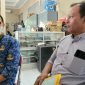 Oknum ASN Kota Kediri, FH saat ditemui Doni, Pendamping Korban dugaan tertipu ratusan juta rupiah untuk CPNS. (Foto : Bimo Detikzone)